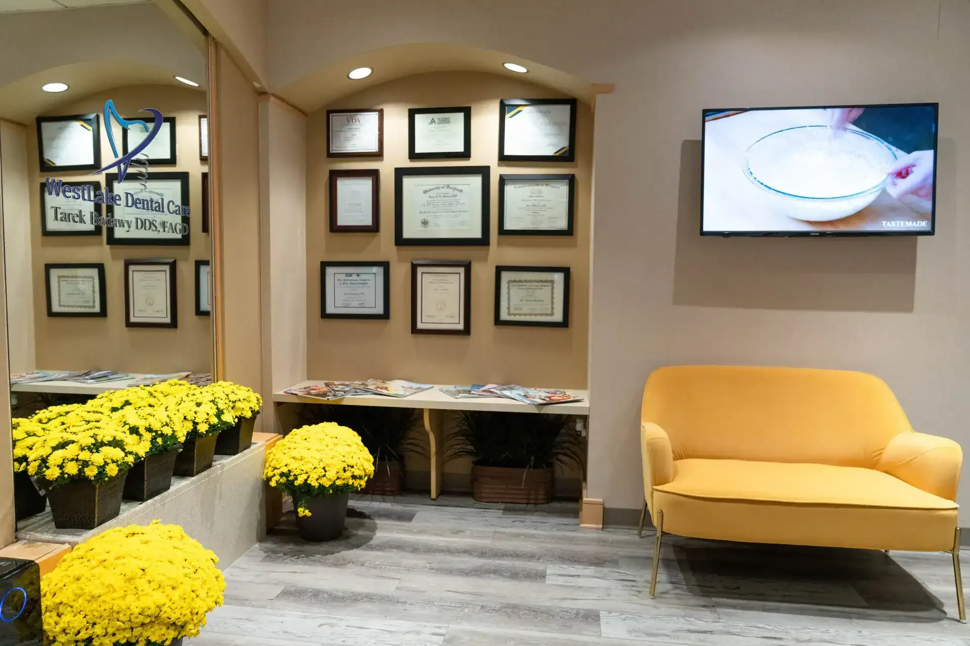 The Westlake Dental lobby in Sterling, Virginia — seating, the diploma wall and the front alcove