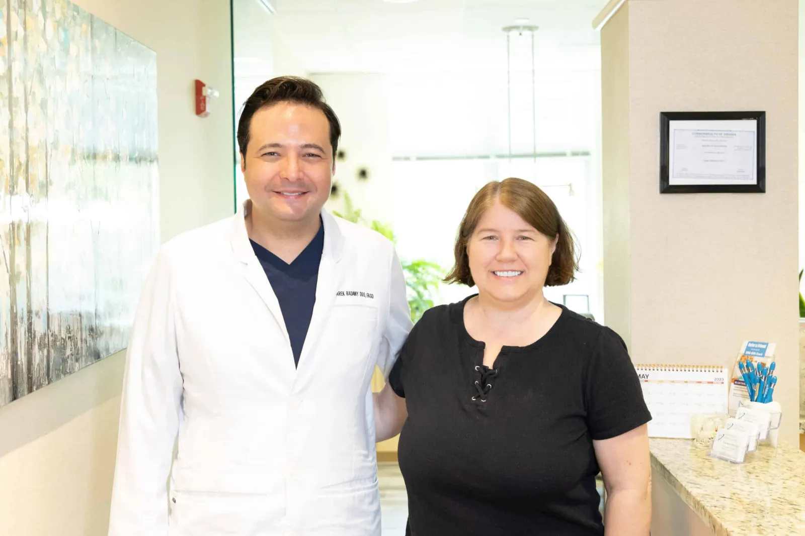 Dr. Tarek Badawy with a Westlake Dental Care guest in the office